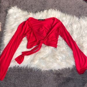 Knot front flare long sleeve top